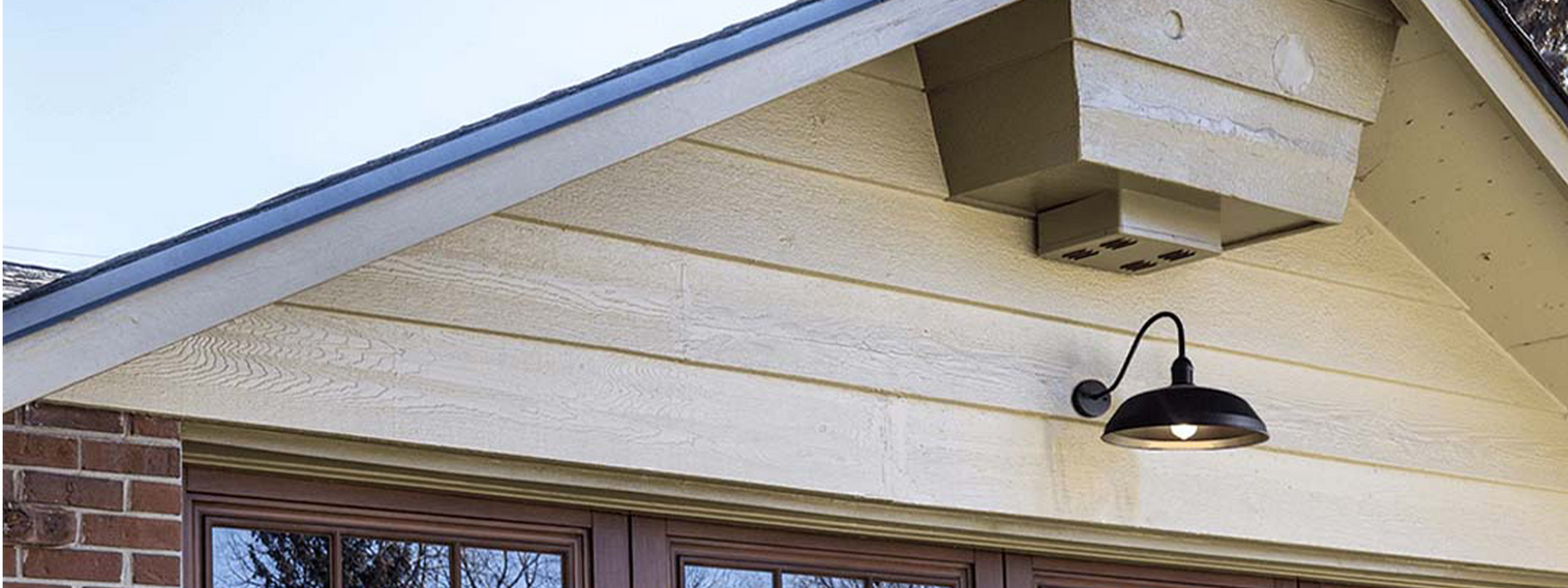 The Gia Collection from HOMEnhancements offers a striking selection of glossy pendant lights in vibrant hues like red, white, and black, designed to make a bold statement in any room. 